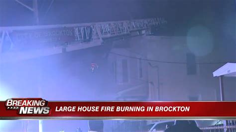 Fire crews battle large Brockton blaze that spread through 2 multi-family homes